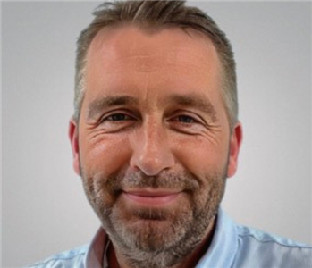 man in collared shirt